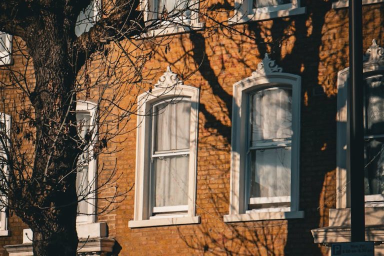 A row of sash windows on a Chelsea terraced town house